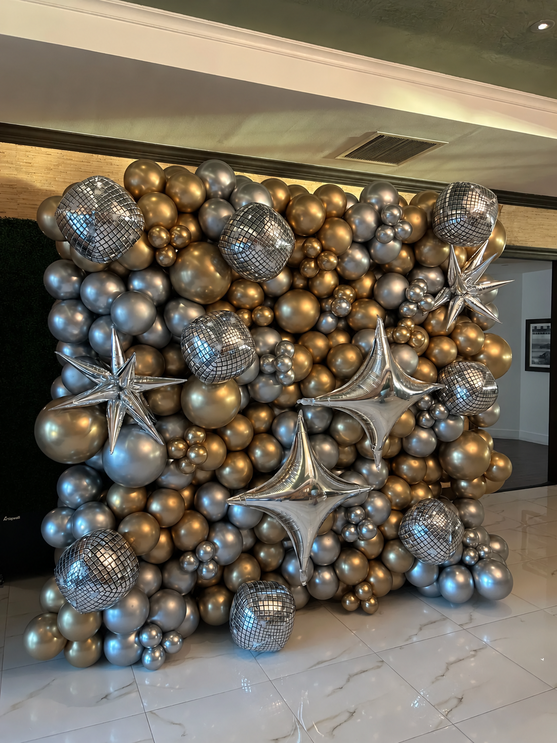 Metallic champagne, silver and gold balloon installation